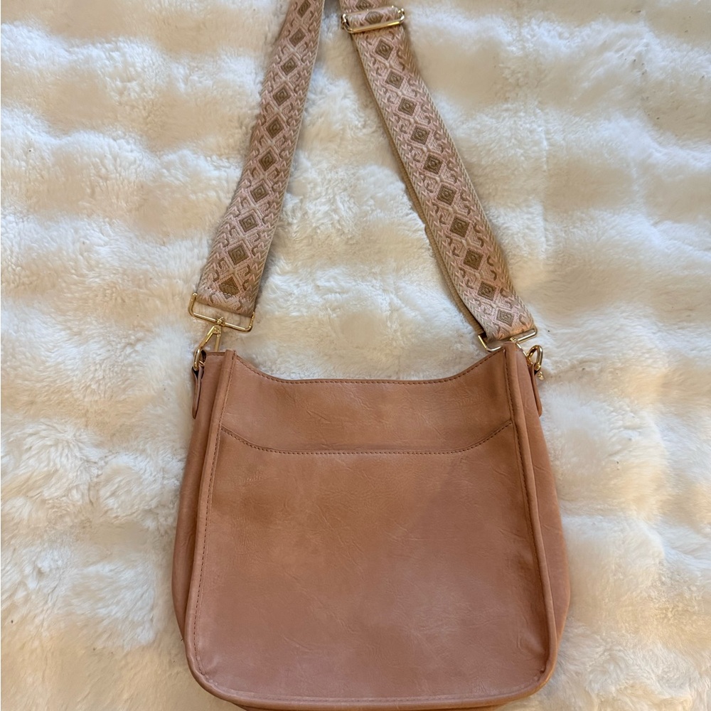 Blush leather crossbody bag with interchangable straps